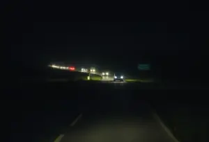 Nighttime view of Dixie Highway highlighting safety concerns for pedestrians