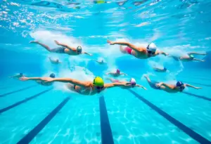 Louisville swimming team practicing in the pool