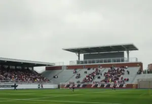 Crowd at a high school soccer game in Louisville with bleachers.