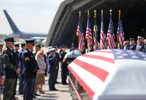 Dignified transfer ceremony honoring fallen service members at Dover Air Force Base
