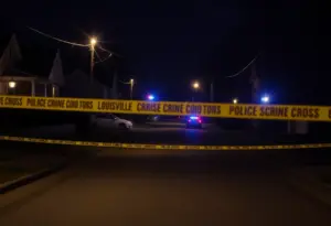 Police investigation scene in Louisville after a shooting incident