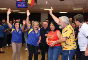 Bowling athletes celebrating at the Special Olympics Kentucky Tournament