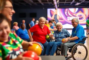A scene from the Special Olympics Kentucky Bowling Tournament featuring athletes competing.