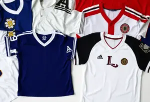 Comparison of a counterfeit jersey next to an authentic jersey, highlighting differences in fabric and stitching