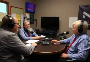 Staff at Louisville Public Media discussing funding strategies