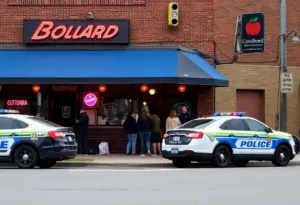Emergency response outside Lenny's Lounge in Louisville after a shooting incident.